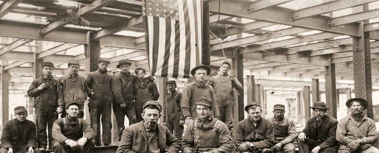 historical image in black and white with american flag behind